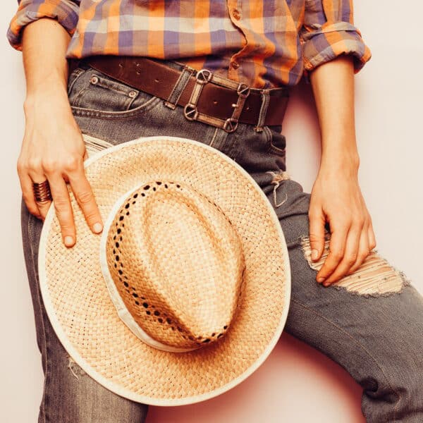 Country Cowboy style hat, jeans, plaid shirt