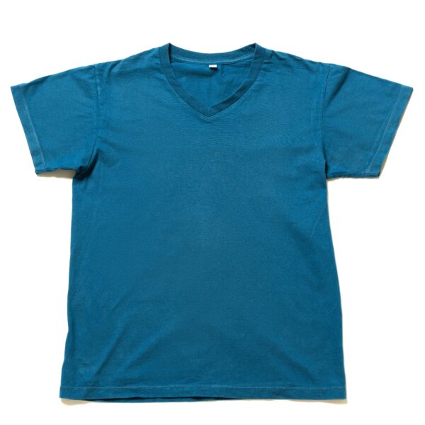 Worn blue t-shirt on white background